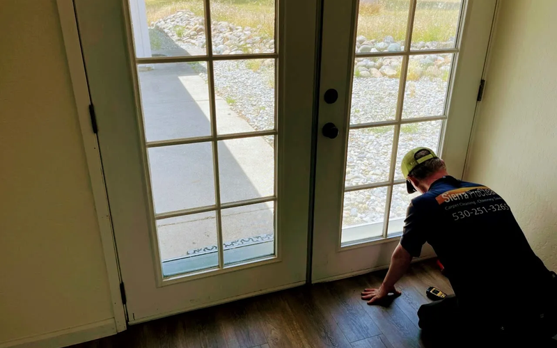 Professional home inspector reviewing findings on clipboard